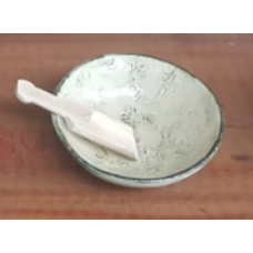Yellow green flat bowl with scoop
